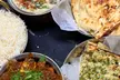 Savor Delicious Meals: $50 or $100 Toward Dine-In or Takeout at Rasoi | Bowls & More (Up to 20% Off) - Second Medium