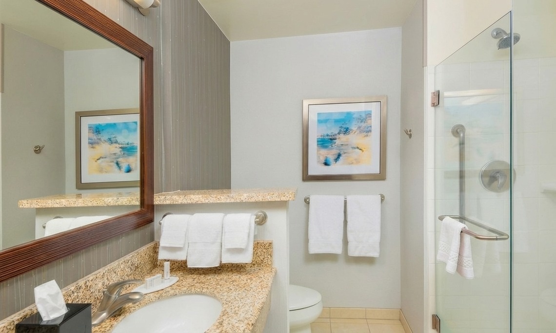 Courtyard-Style Hotel Retreat with Outdoor Pool & Bistro Dining