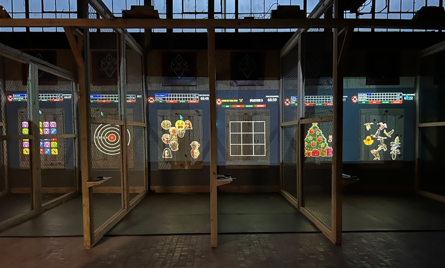 Image 2: One Hour Glow Dark Axe Throwing for Up to Four People in 1 or 2 Lanes