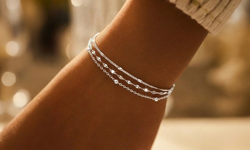 Image 7: Parure de bijoux 3 pièces : bracelet, chevillère et boucles d'oreilles