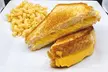 Indulge in The Cheesy Chick's Two Sandwiches & Two Sides or $10 Voucher at33% Off - Perfect for a Tasty Meal Out - Second Medium