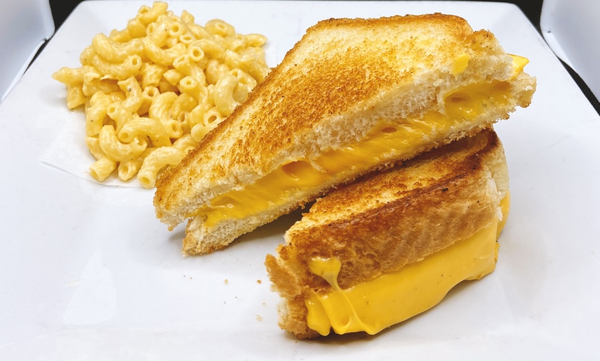 Image 2: Enjoy Two Sandwiches & Two Sides or $10 Voucher| Delicious Deals Await