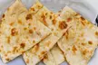 $25 or $50 Toward Food and Drink Or Dinner with Drink for Two or Four People at The Spice Garden (Up to 30% Off) - Second Medium