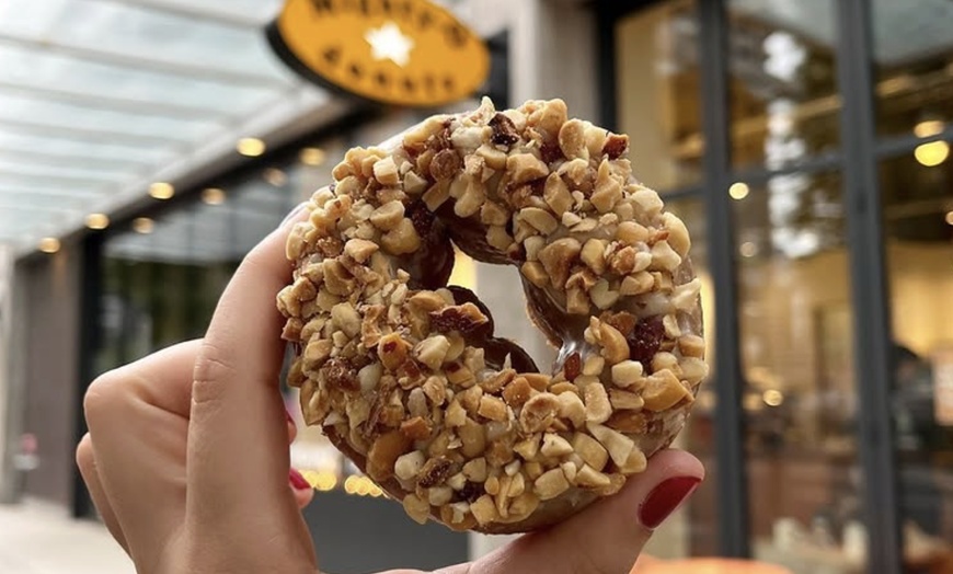 Image 23: Up to a Dozen Donuts, 4 Donuts & 2 Drinks or $50 to Spend