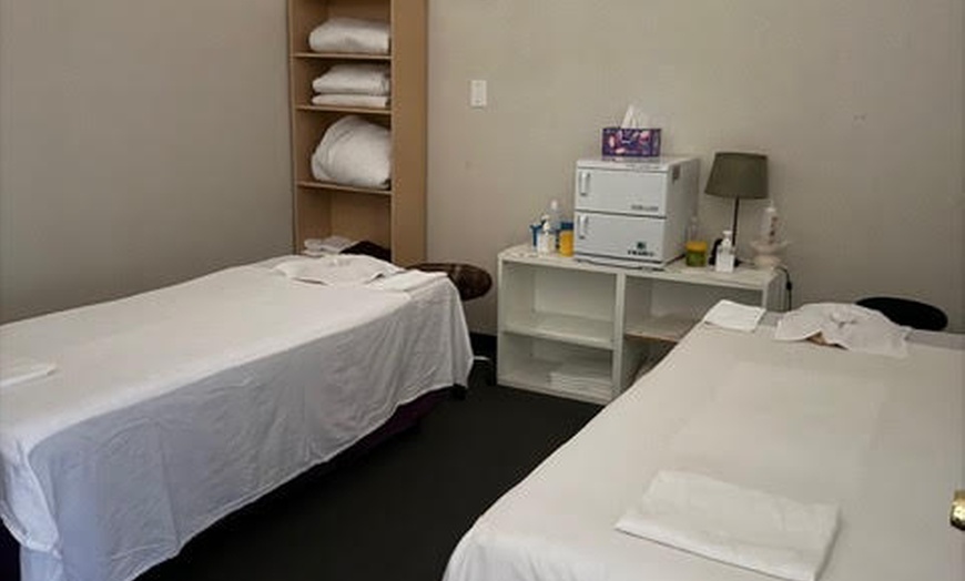 Image 5: Massages for 1 or 2 with Aromatherapy and Optional Hot Stones 