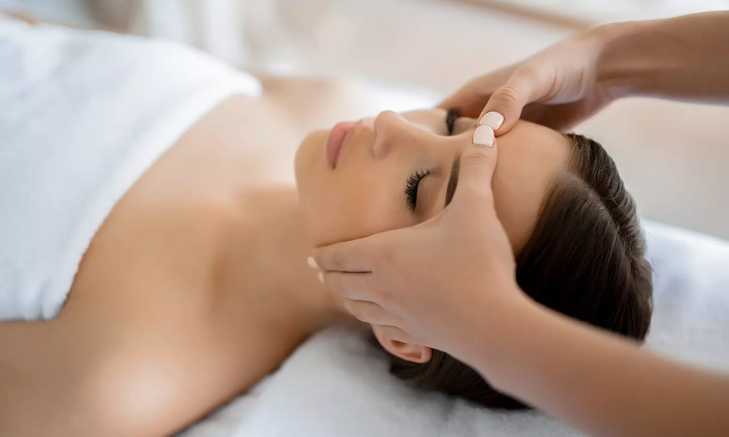 Custom Full-Body Massage + Headache Relief with Hot Stones at Cocolux Massage (Up to 49%Off) - Primary Image
