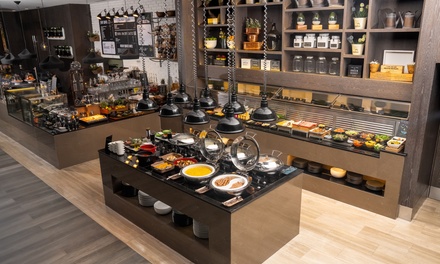 For One Child: Breakfast Buffet with Fresh Juices & Eggs Your Way - Café 302 at 4* Al Maha Arjaan by Rotana