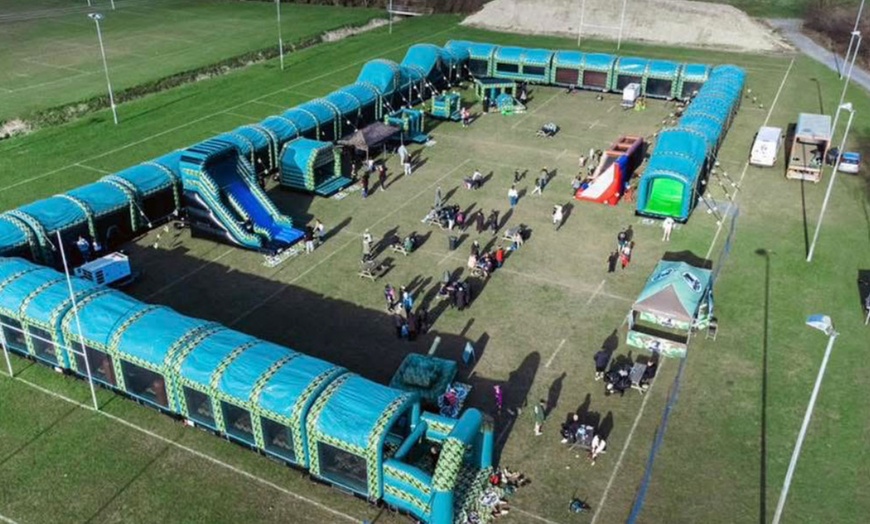 Image 3: Bounce Camp: Family Tickets for 640ft Inflatable Obstacle Course Fun
