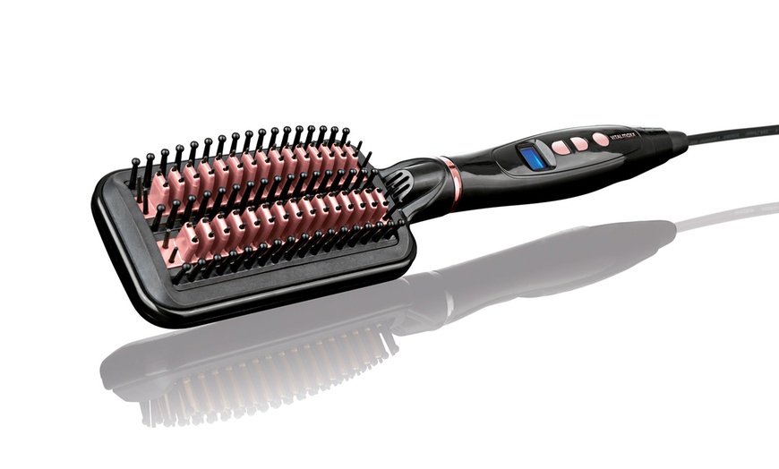 Image 2: Heated Hair-Straightening Brush