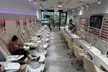 No-Chip Manicure and Pedicure Packages, SNS Dipping Powder, and More at Dazzel Nail And Spa (Up to 37% Off) - Second Medium