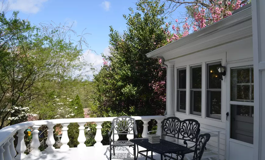 Wraparound Veranda & English Gardens