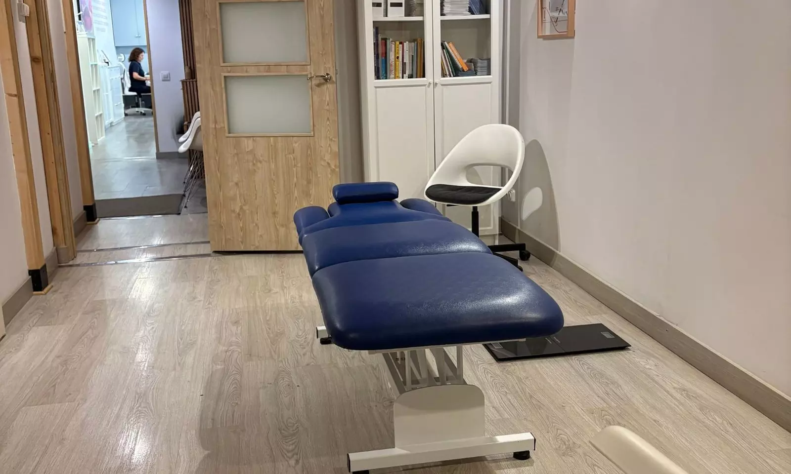 Examen postural y ajuste quiropráctico con termografía