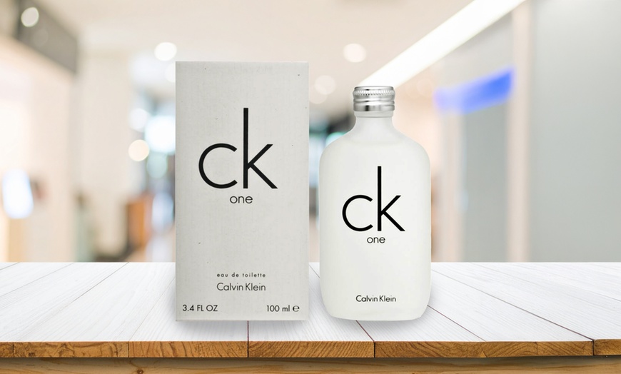 Image 1: Calvin Klein CK One Eau De Toilette Spray 3.4 Fl. Oz.