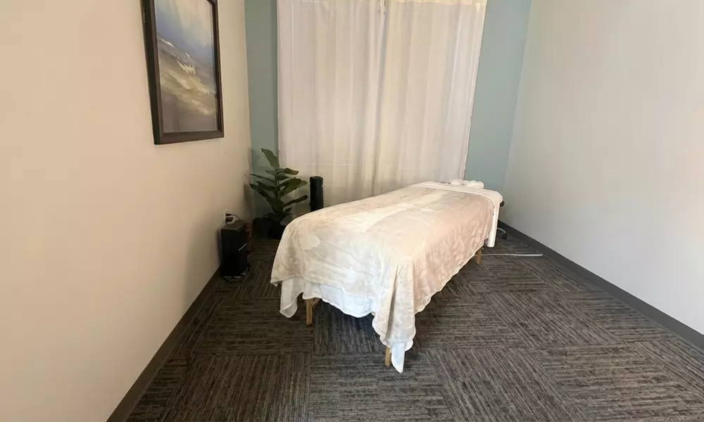 Triangle Spine Center: One or Three Sessions 60 or 90-Min Swedish, Deep Tissue or Sports Massage(Up to 30% Off)