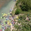 Image 1: Enjoy a Hassle-Free Tubing Adventure w/ Transportation & Cooler Setup