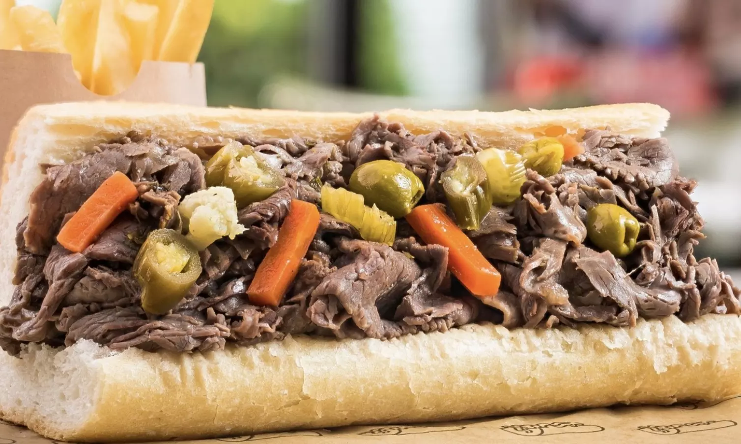 A Taste of Chicago in Knoxville - Pizza, Italian Sausage, Gift Cards or Sandwiches I Up to 34% Off - Primary Image