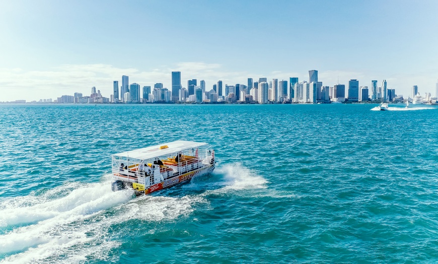 Image 1: City Bus Tour, Sightseeing Cruise, & Water Taxi Tickets for One or Two