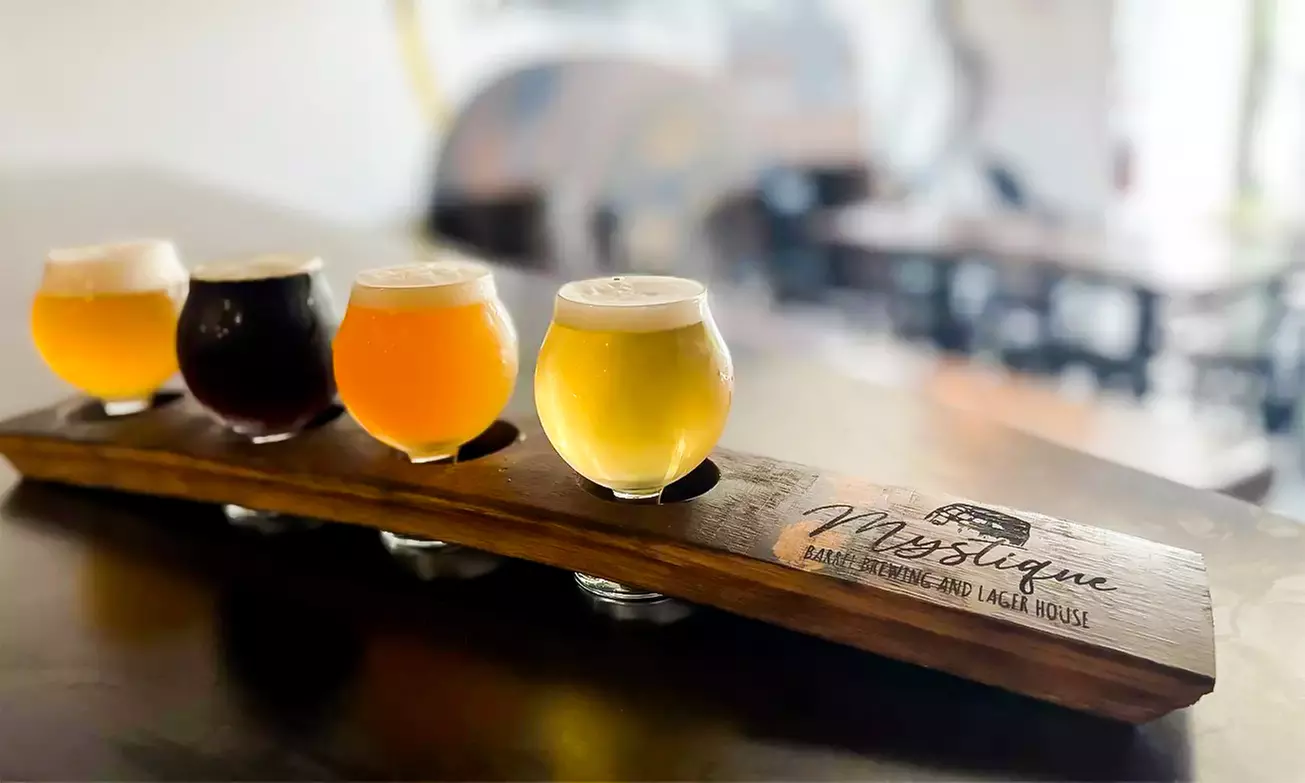 1, 2, or 4 Beer or Seltzer Flights (Four 4oz Pours) at Mystique Barrel Brewing and Lager House (Up to 38% Off) - Primary Image
