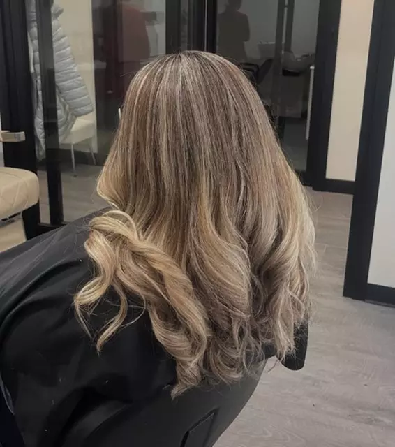 Get a Haircut with Choice of Highlights and Style Options 