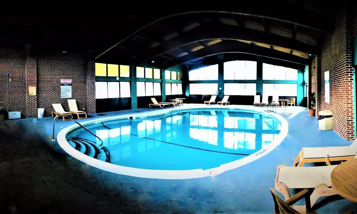 Riverside retreat with pool, fitness center, and on-site dining