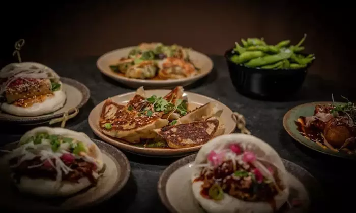 Savor Bao Buns, Sides, and Drinks for up to Four!