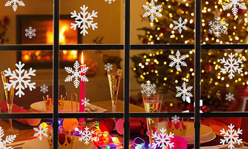 Image 1: Up to 162 Snowflake Window Stickers