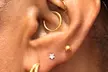 Enjoy Infinite Suites's Helix or Lobe Piercing Experience with Jewelry Included (Up to 45% Off) - Second Medium