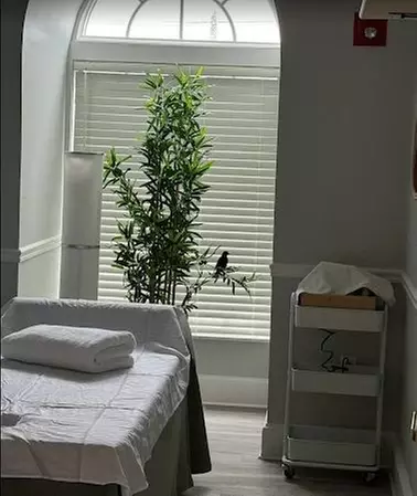 60-Minute Therapeutic Massage or Couples Massage with Hot Stones