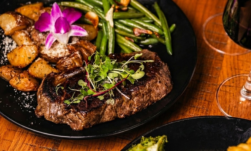 Image 2: Dinner for Two or Four with Cocktails or $50 or $100 Dining Credit