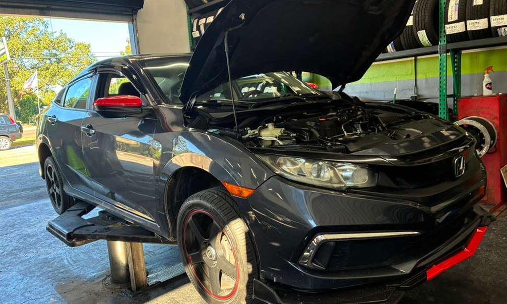 Boost Your Ride with a Complete Oil Change & 4-Wheel Alignment Service