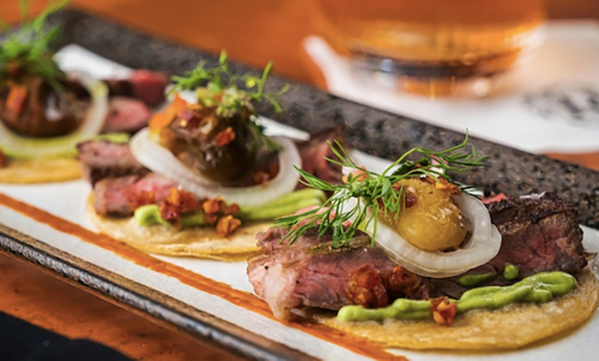 Image 6: Three-Course Dinners or Dining Credits at a NYC Wine Lounge