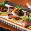 Image 6: Three-Course Dinners or Dining Credits at a NYC Wine Lounge