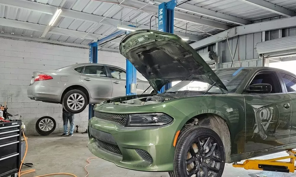 One Full Synthetic Oil Change w/ Regular Filter Replacement and More