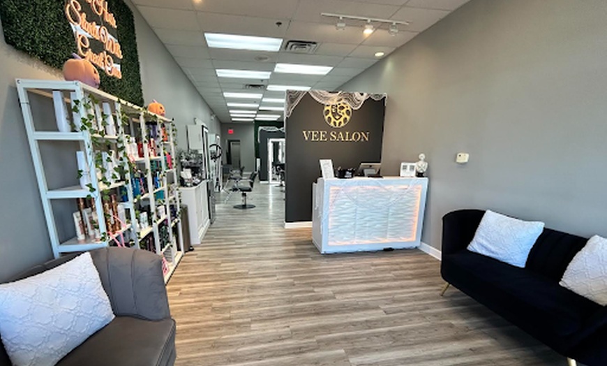 Image 6: Partial or Full Highlight Package with Haircut, Blow Dry, and Styling