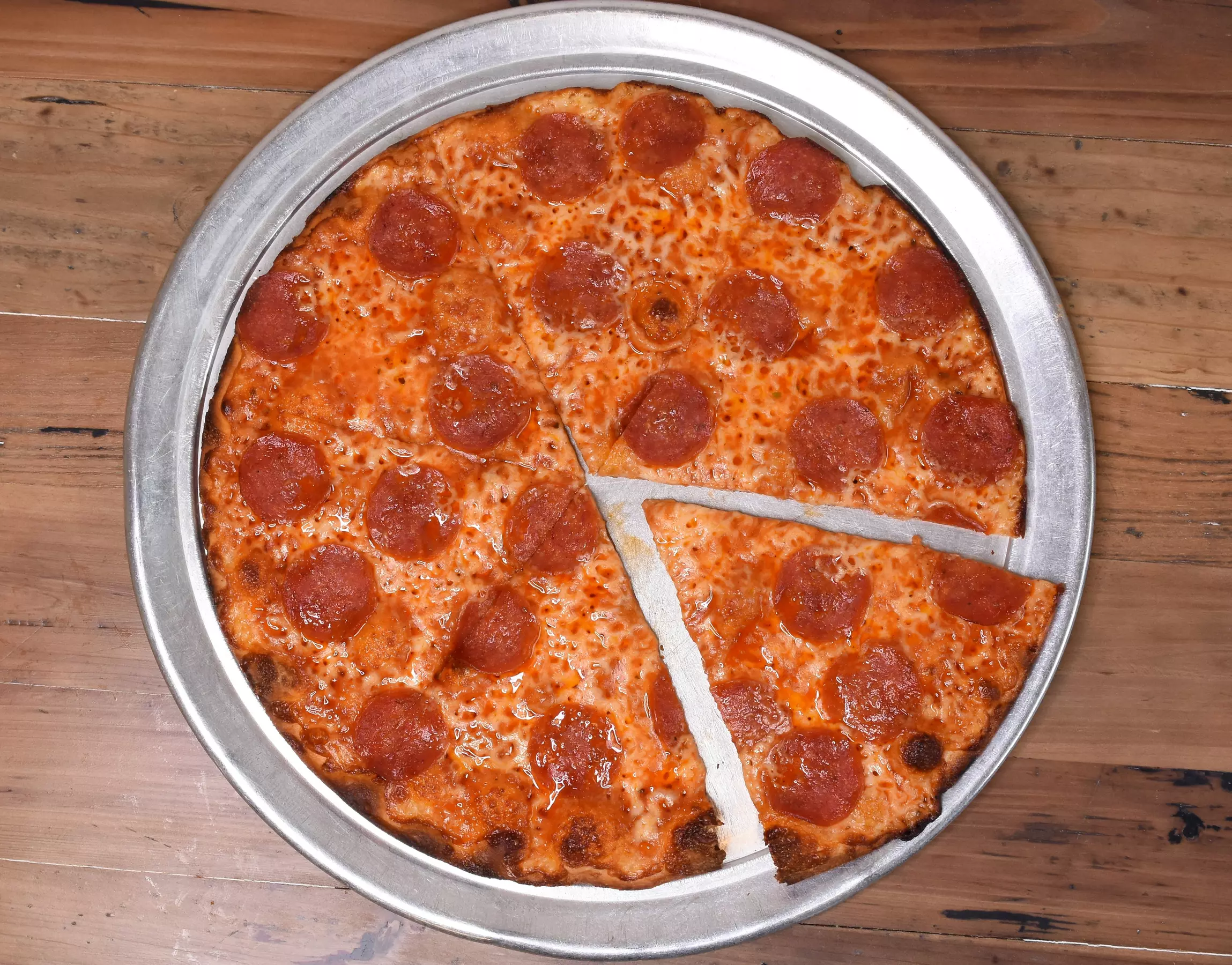 Pizza at Riko's Pizza (Up to 40% Off). Two Options Available. - Primary Image