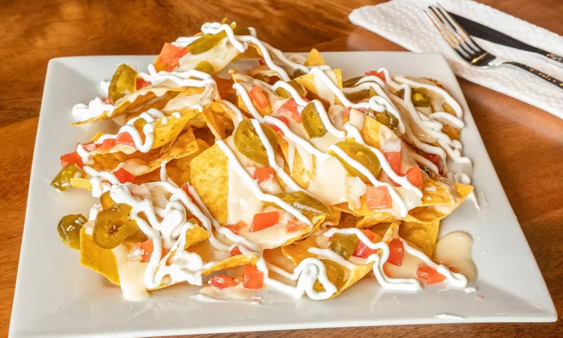 $50, $75, or $100 Dining Credit | Dozen Wings, Fries, Entrees, & More