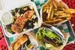 Indulge in Wells Roadside's $20, $40, or $60 Credit or One Year of Shakes, Burgers, or Both (Up to 74% Off) - Second Medium