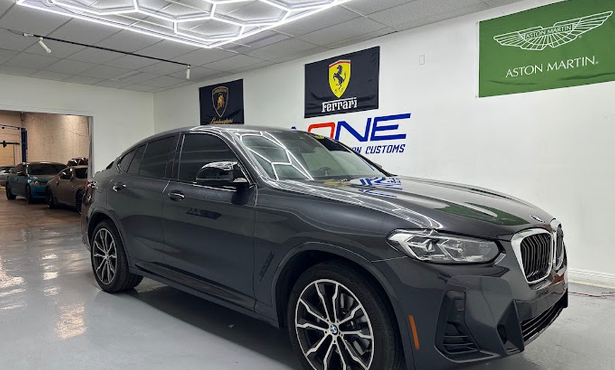 Image 1: Window Tinting - For Pickup, Sedan, or SUV - Up to 3, 5, or 7 Windows