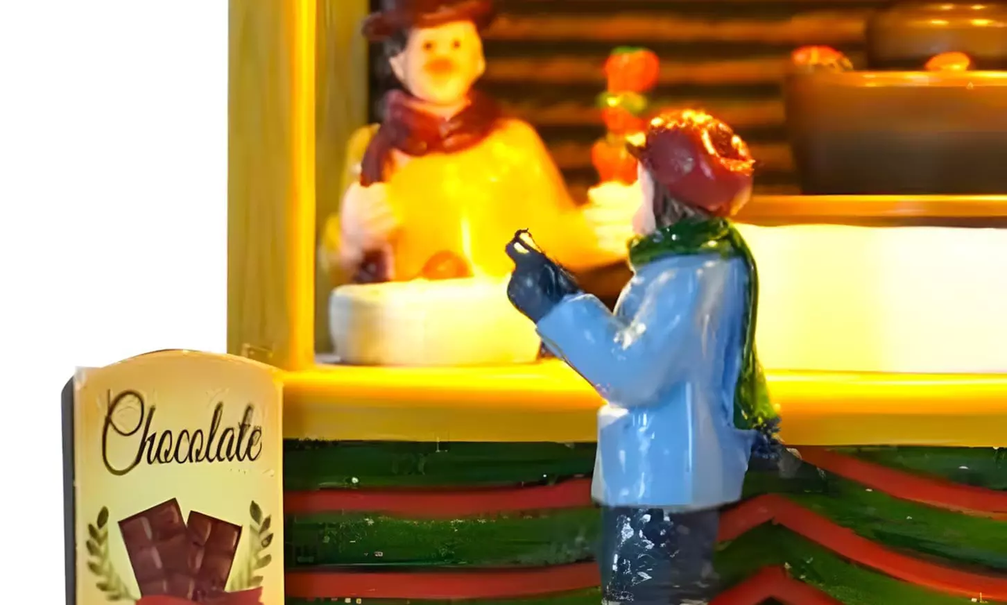 Weihnachtliche Szene mit Musik und Beleuchtung