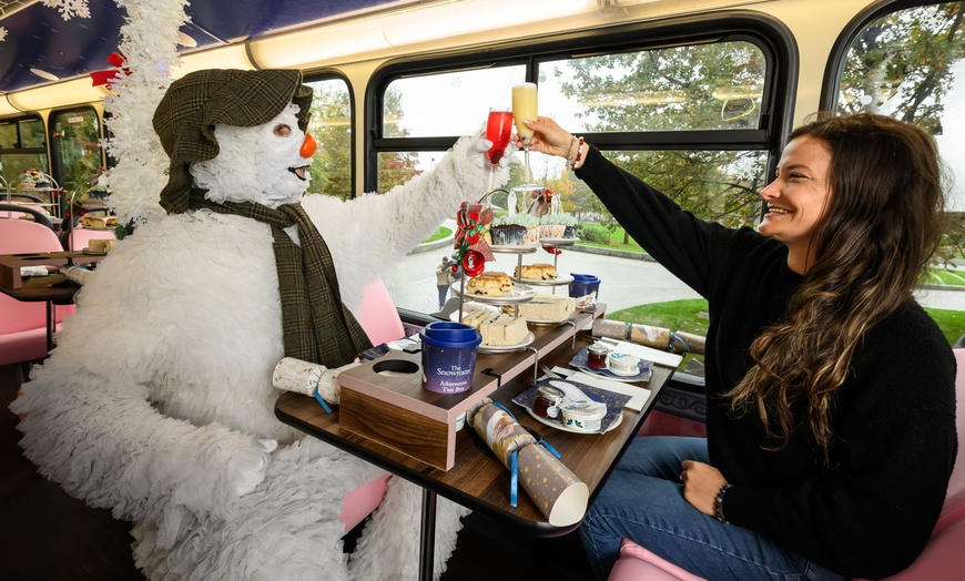 Image 3: The Snowman Afternoon Tea Bus Tour in London, Perfect Christmas Gift!