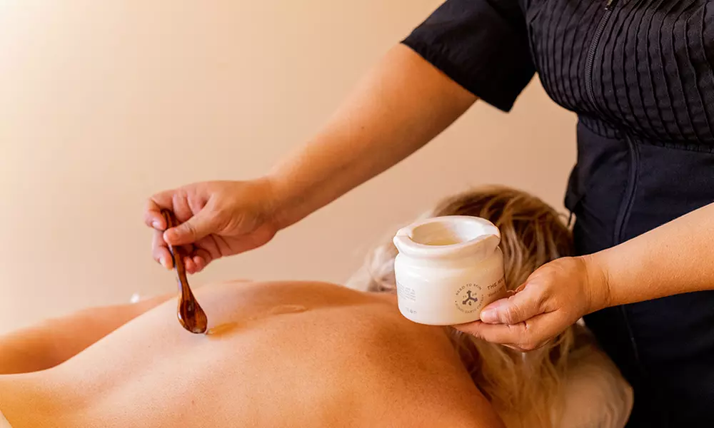 Spa Day with 50-Minute Signature Massage or Facial