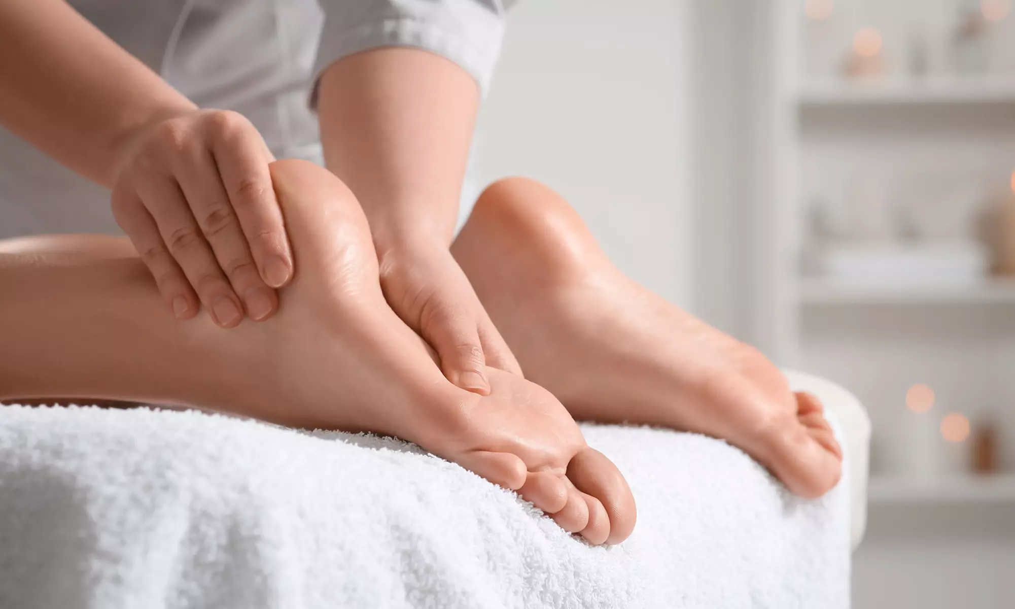 50-Min Therapeutic Massage + Hot Stones for 1 or Couples or 60-Min Custom Combo Massage (Up to 50% Off)