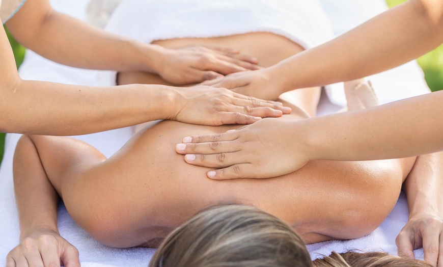 Image 1: 60-Minute Tibetan Four-Hand Full-Body Massage With Two Therapists