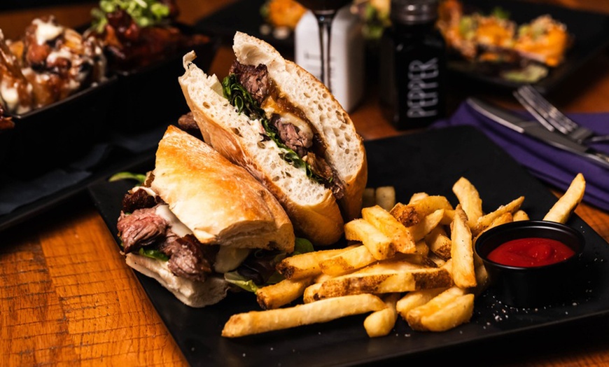 Image 5: Dinner for Two or Four with Cocktails or $50 or $100 Dining Credit