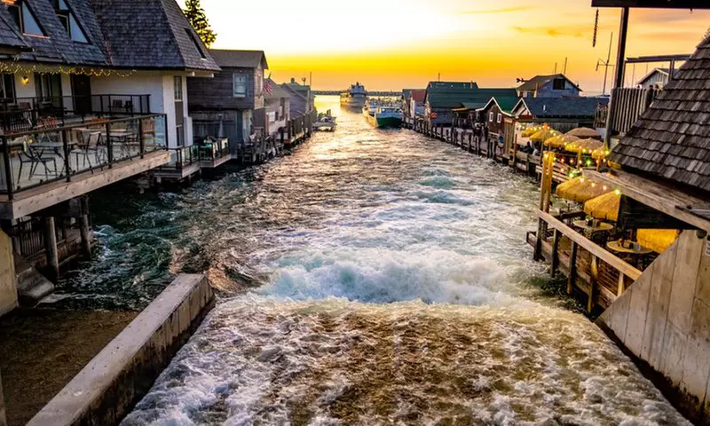 Walk to Fishtown, beaches, and scenic harbor views in Leland