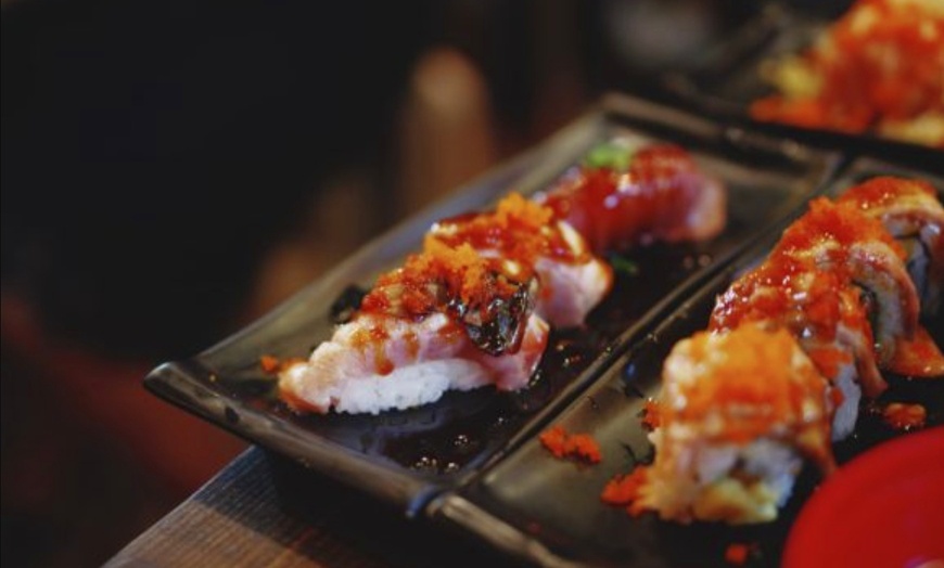 Image 4: Enjoy Authentic Sushi and More with Food and Drink Options