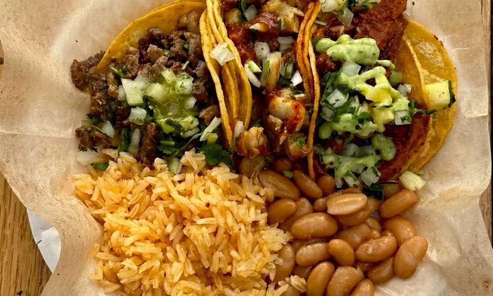 Authentic Mexican Feast Awaits: Eight Tacos and a Side of Rice and Beans or Vampiros (Up to 25% Off)