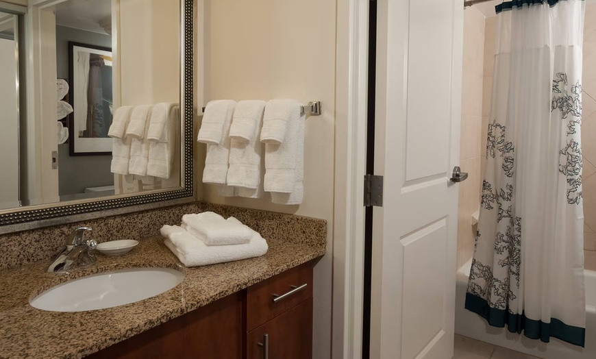 Image 9: Spacious suites, free breakfast, pool, and easy access to beaches