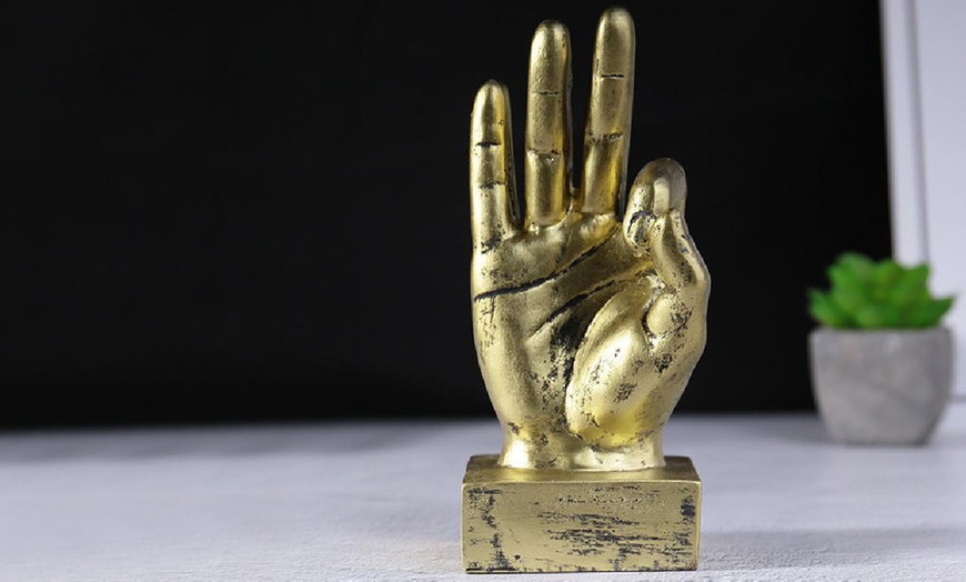 Image 9: Hand Gesture Statue