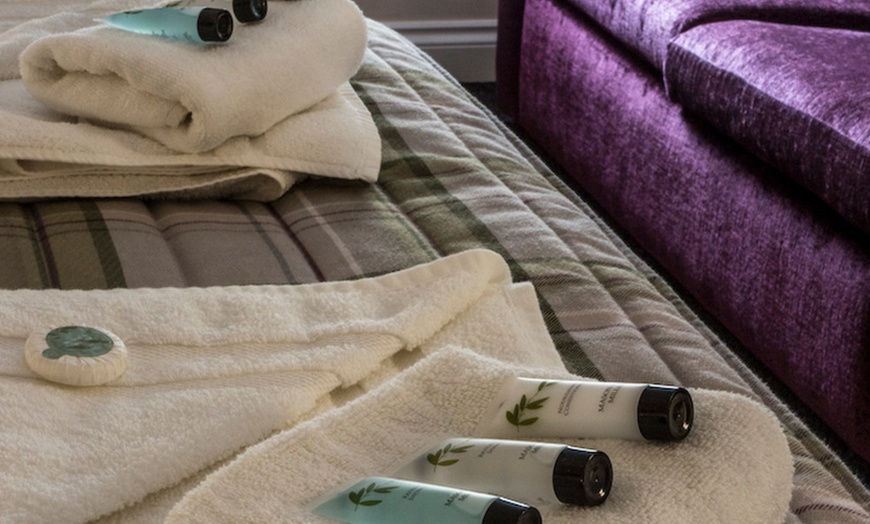 Image 5: Relaxing 60-Min Massage or Facial for Him or Her with Optional Drink